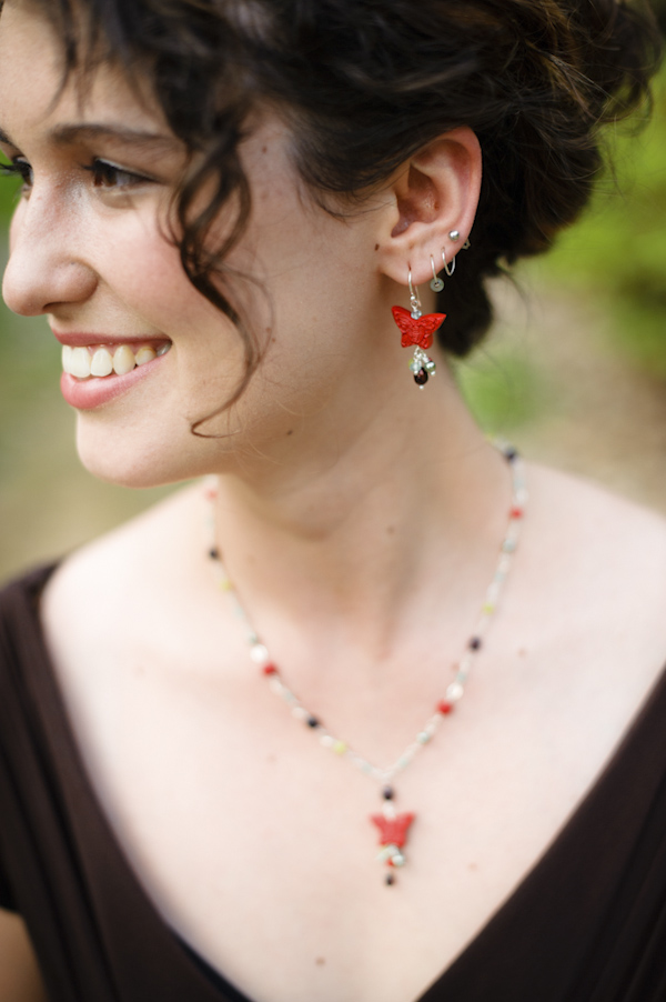 bride with her butterfly jewelry - photo by top Portland, Oregon wedding photographer Aaron Courter